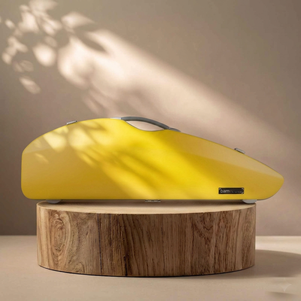Yellow Bam Hightech BonBon Violin Case on a wooden pedestal