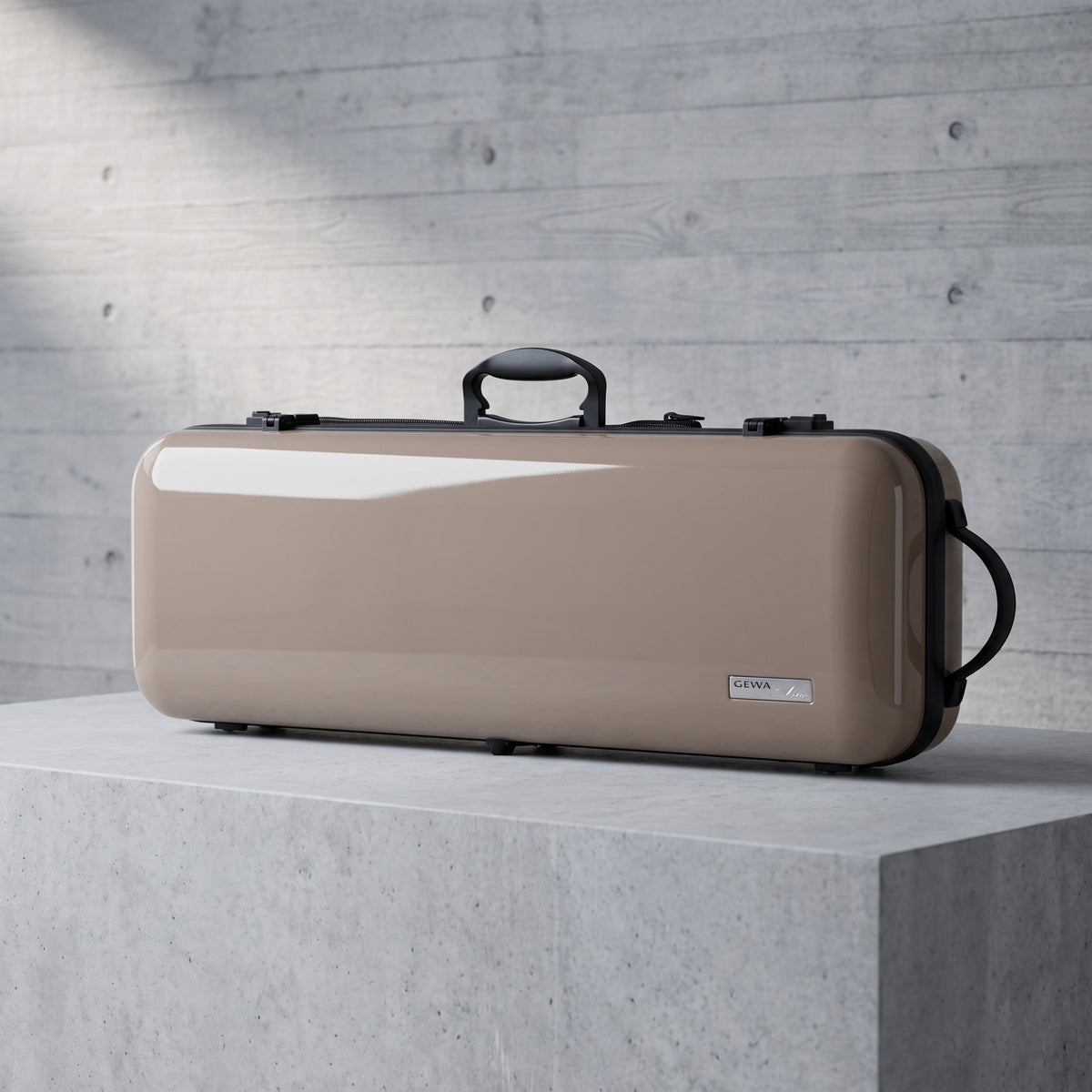 Beige Gewa Air 2.1 Oblong Violin Case on a concrete pedestal