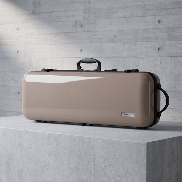 Beige Gewa Air 2.1 Oblong Violin Case on a concrete pedestal