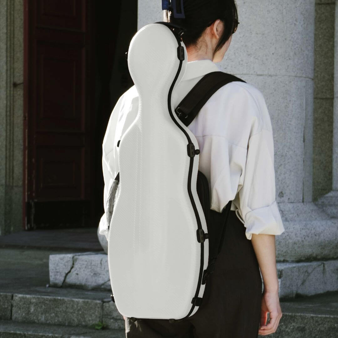 A woman wearing the white Molto Cello-Shaped Viola Case as a backpack