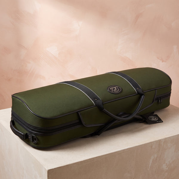 Olive green Pedi Niteflash Oblong Viola Case on a blush studio backdrop